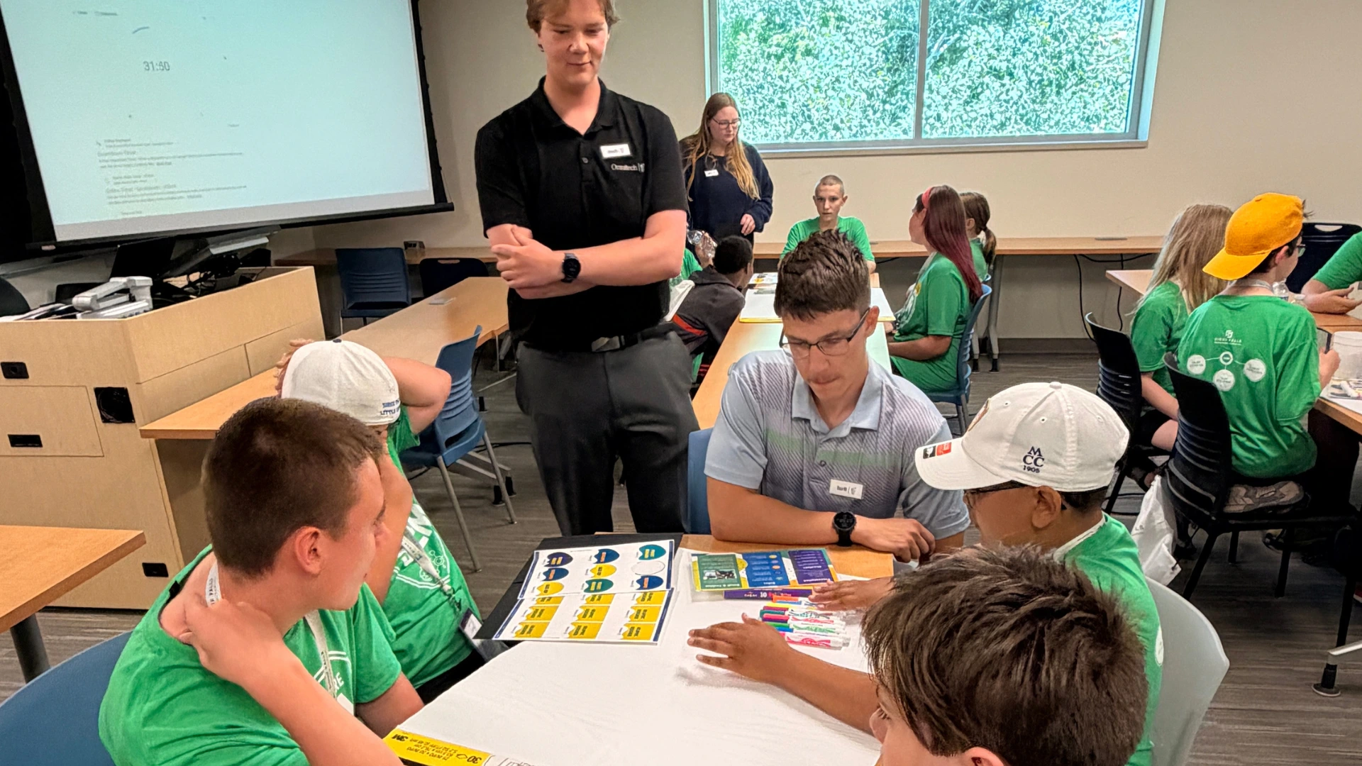 STEM Camp with the Interns teaching kids how to build an app.