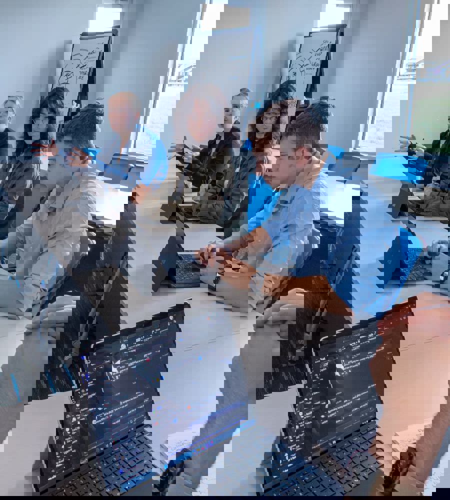 Interns collaborating together in the conference center